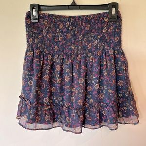 Aqua smocked waist floral, fully lined mini skirt, in size Medium, NWT
